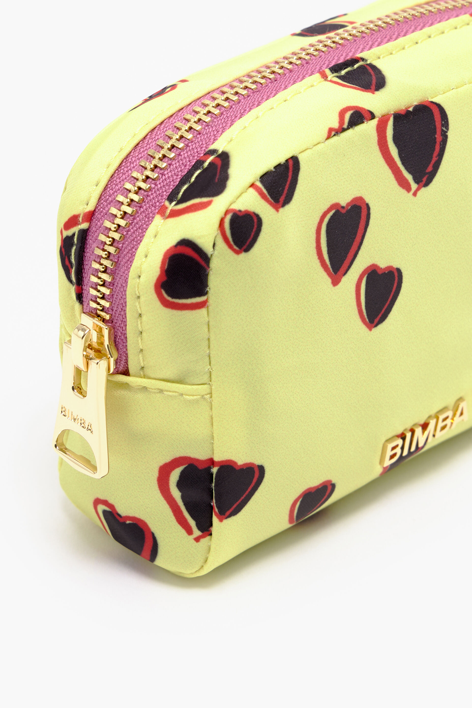 Small rectangular yellow make-up case with Hearts print