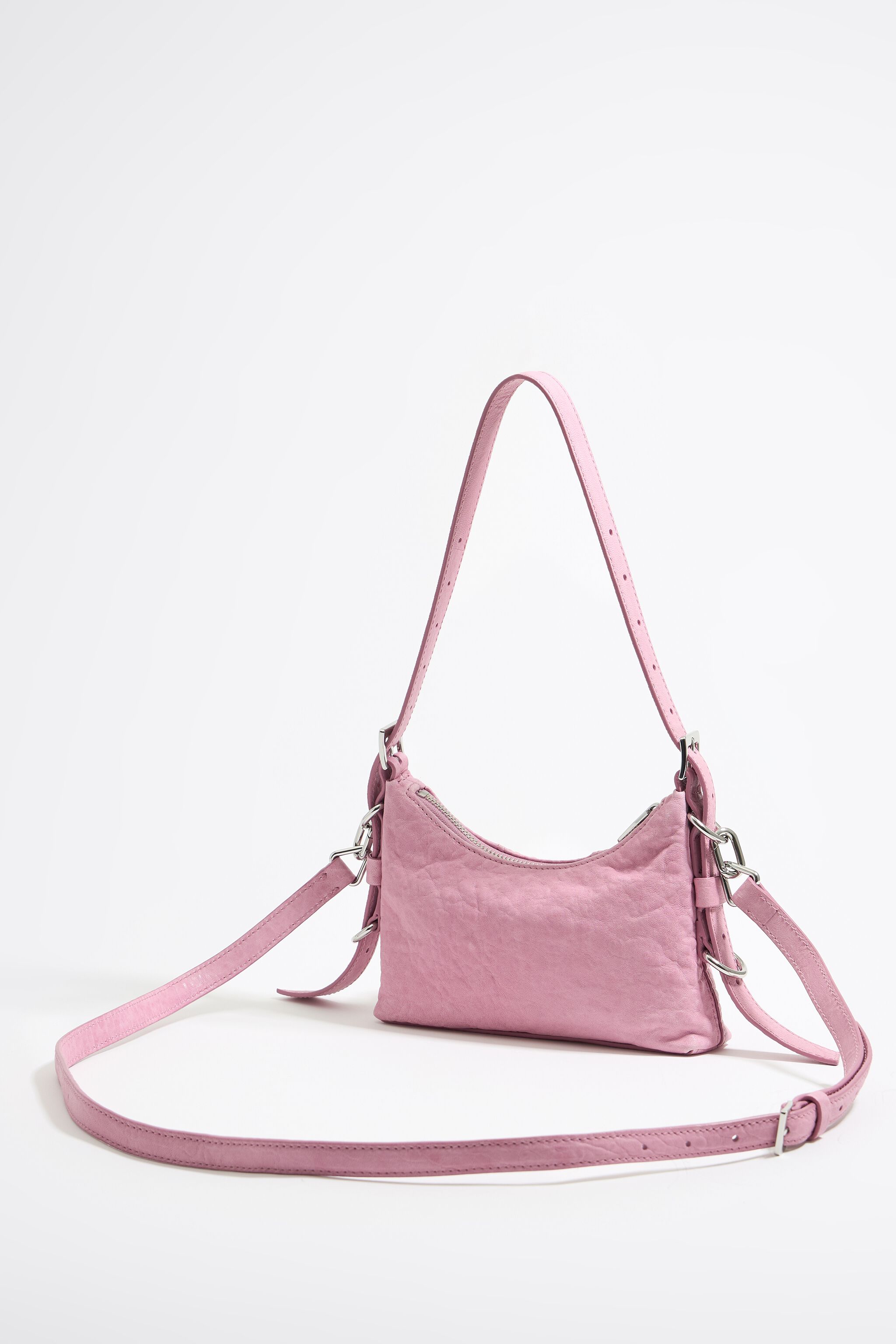 Mini pink leather Pocket slouch bag