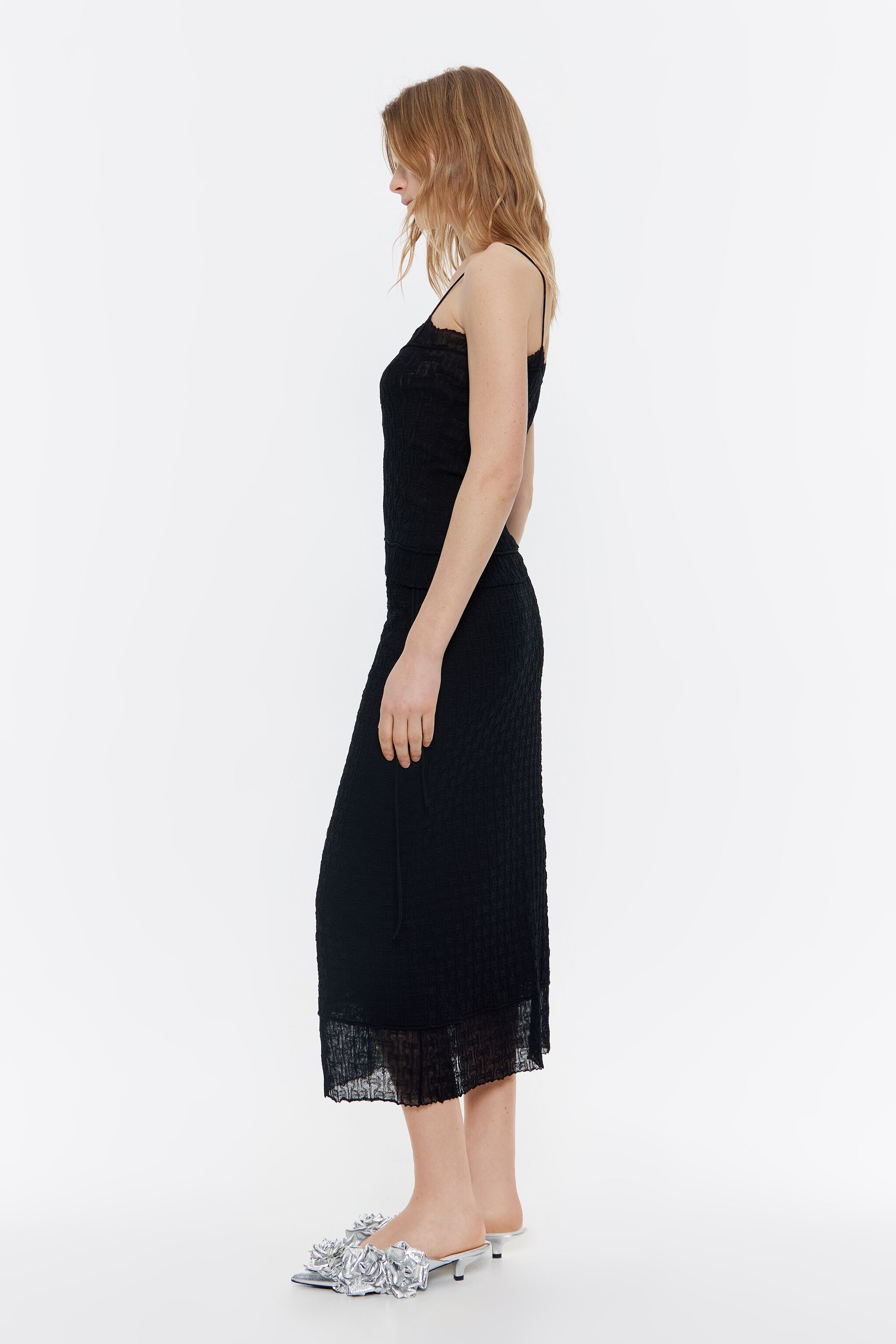 Straight black knit skirt
